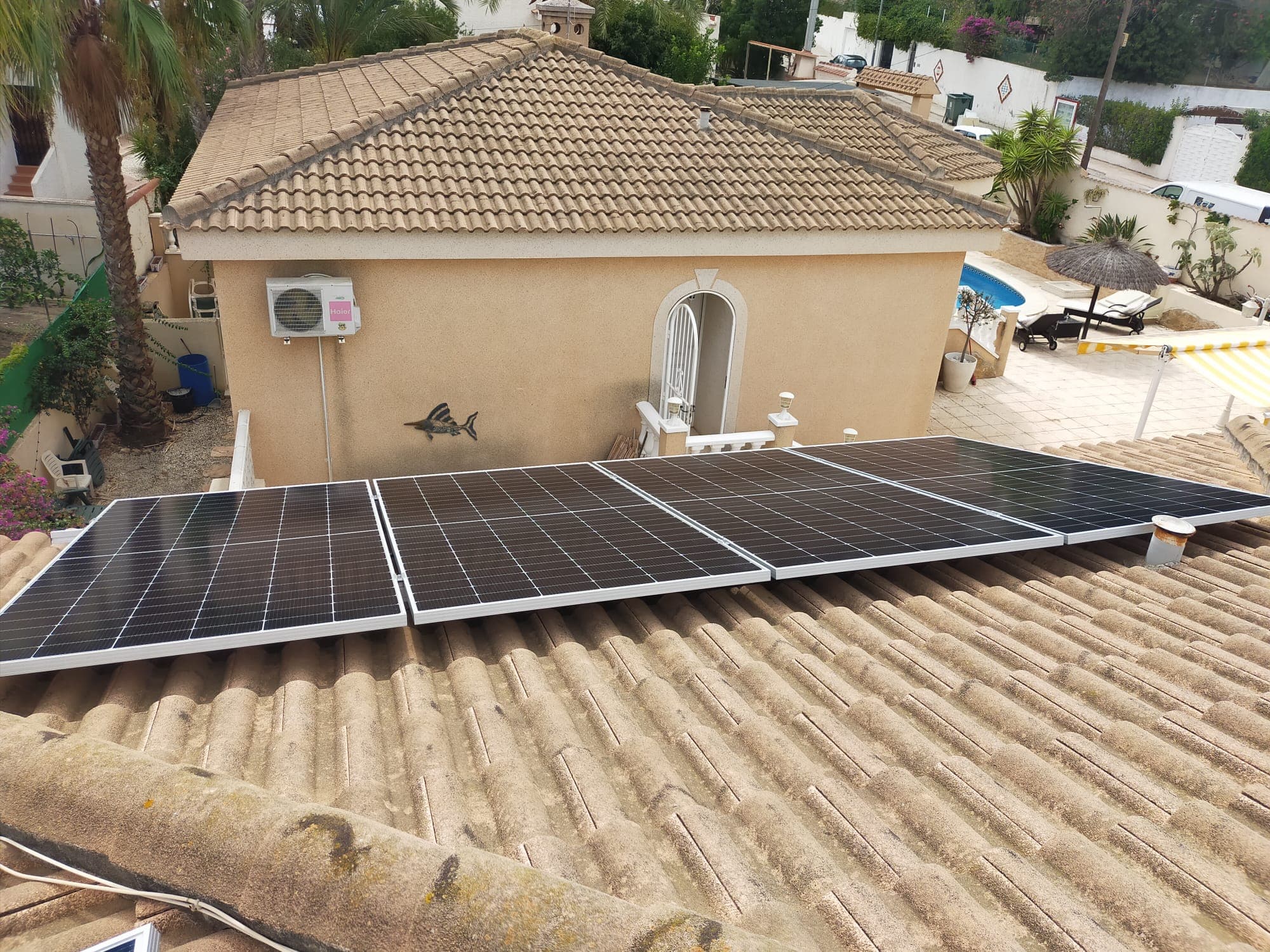 Mounting rails set out across a tiled roof